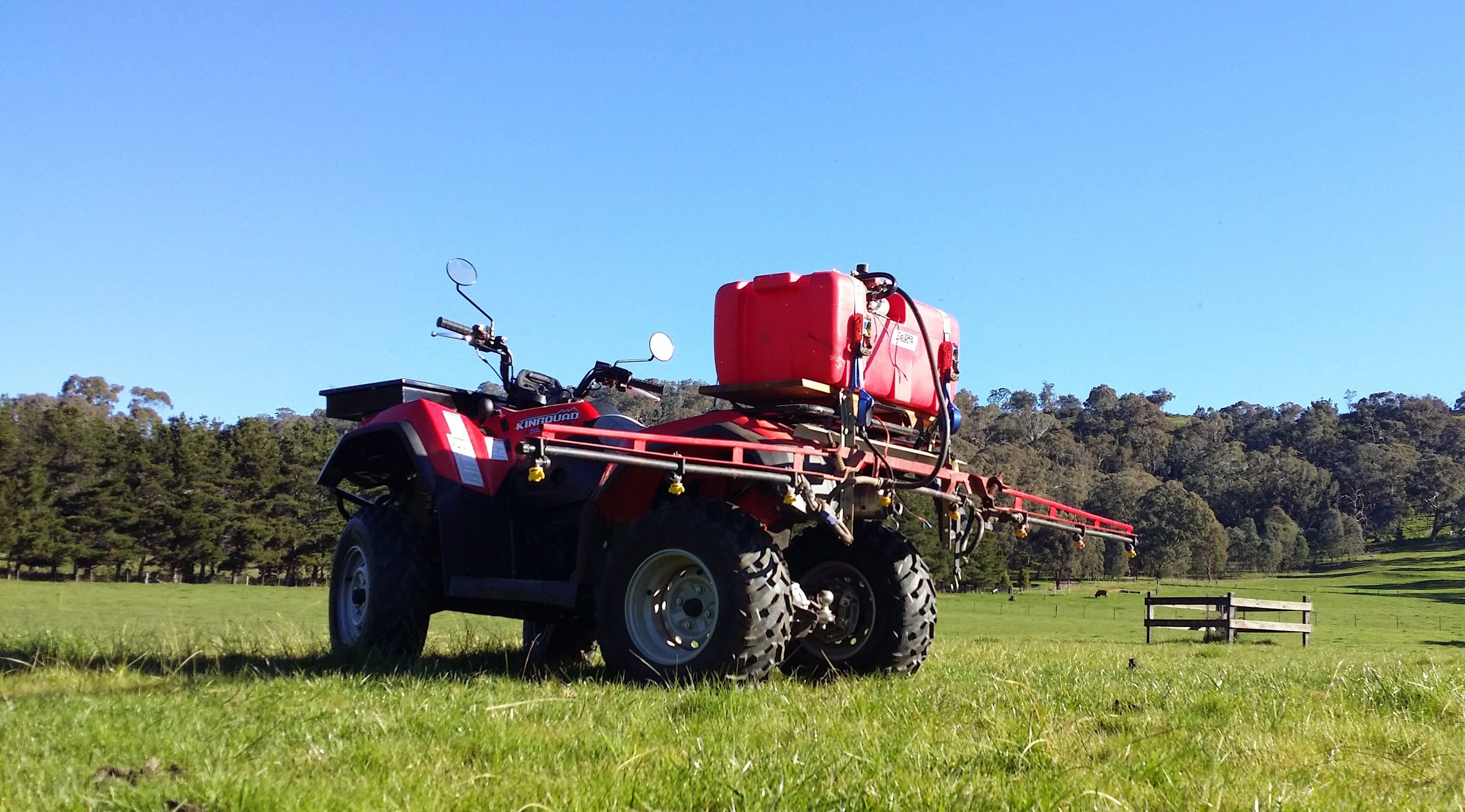 4x4 motorbike spraying a field